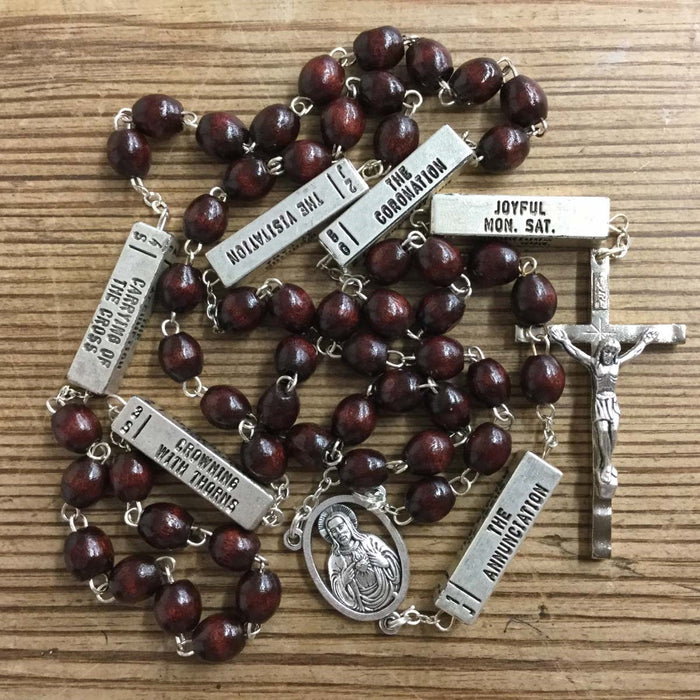 Brown Wooden Rosary With the Mysteries of the Rosary